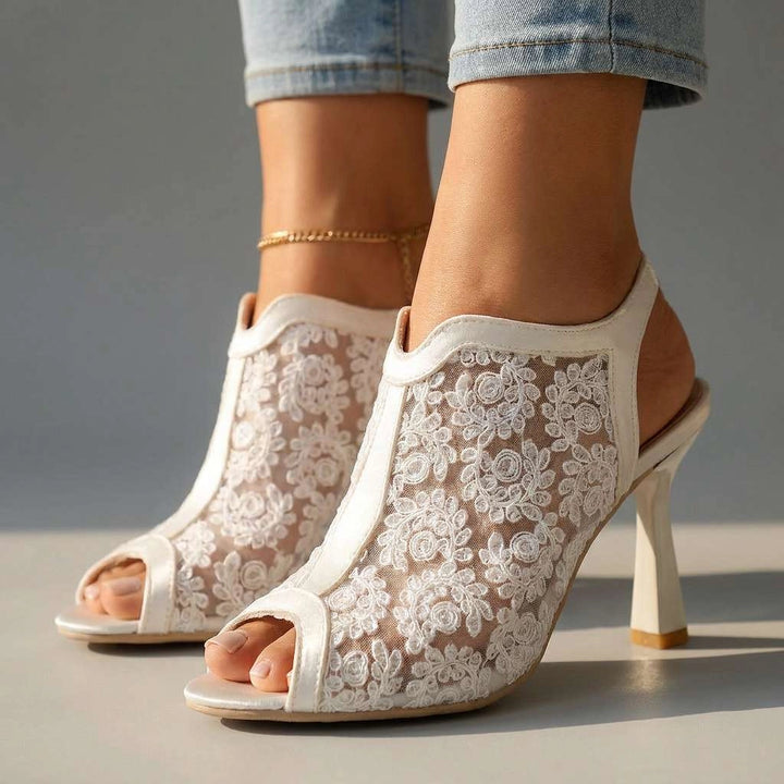 Open toe white lace heels (2).png